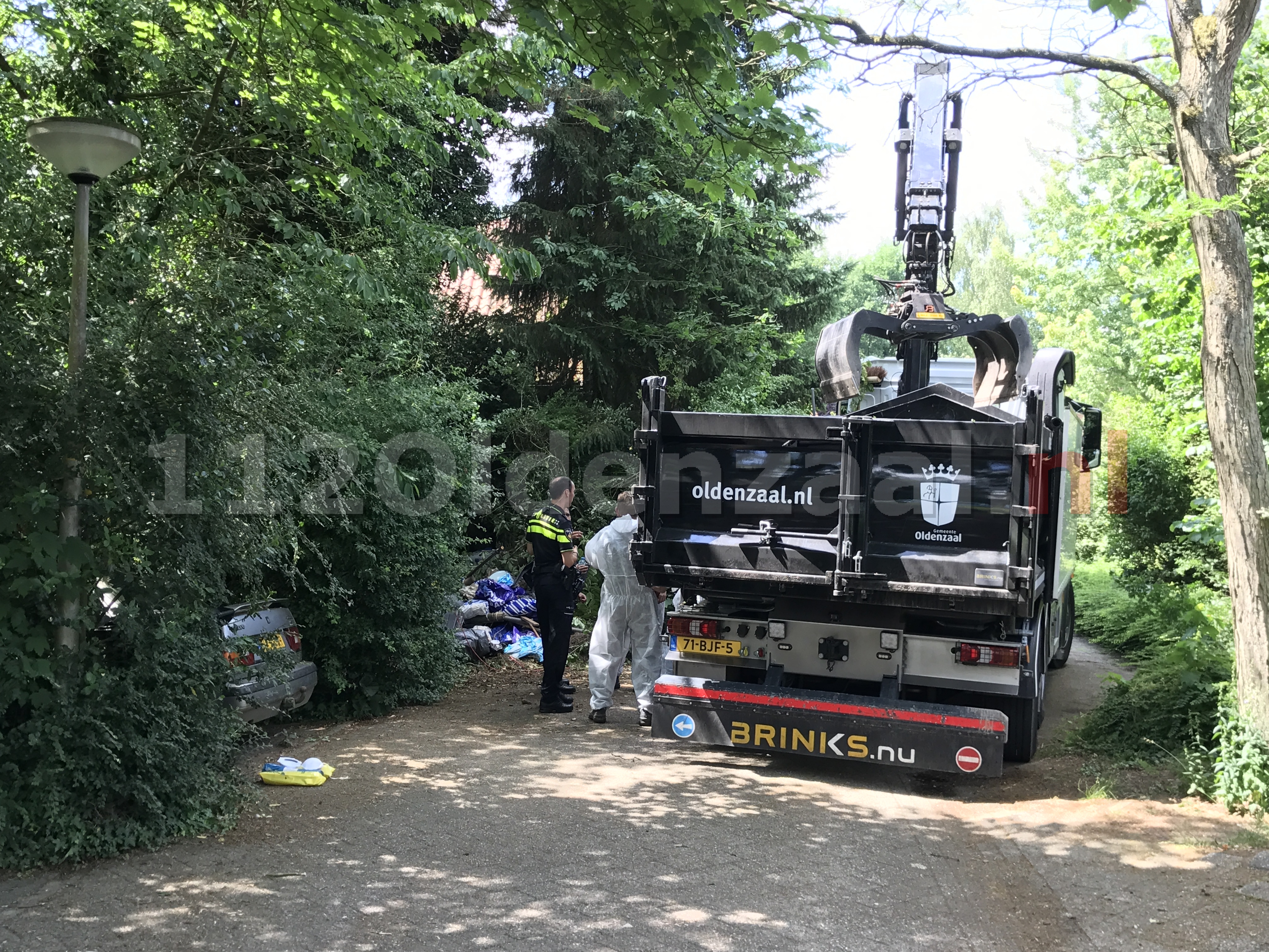 Foto 2: Politie doet onderzoek in woning Oldenzaal na aantreffen lichaam